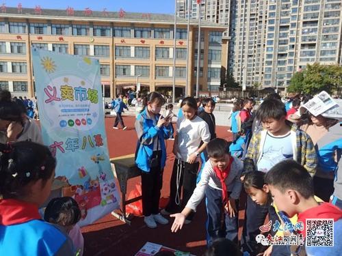 义卖活动图片,义卖情深——义卖活动精彩瞬间回顾”